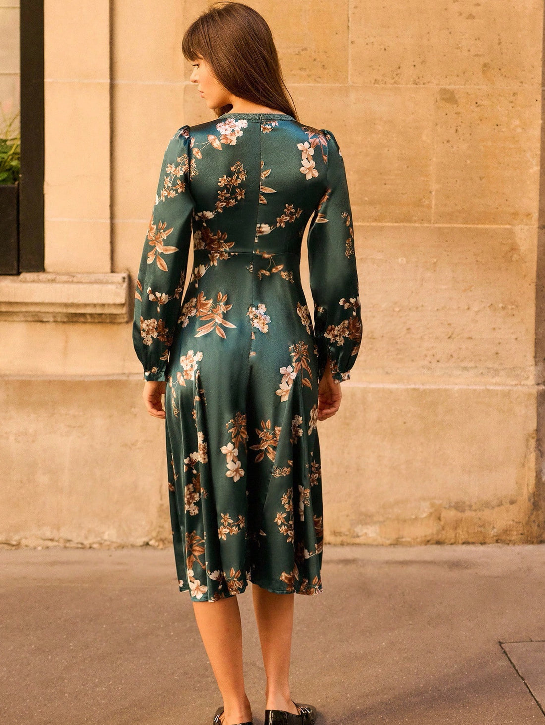 Twirl into autumn with this stunning floral satin midi dress that effortlessly transitions from boardroom to brunch. The delicate lace trim adds a touch of romance, while the flowing silhouette flatters every frame. Whether you're impressing colleagues or catching up with friends, this versatile piece proves you don't have to choose between polished and pretty. Soft, sophisticated, and undeniably chic—your new fall favorite awaits.