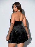 Black corset-style strapless mini dress with sparkling neckline trim and flared skirt