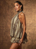 Side view of snakeskin-print chiffon mini dress showing gathered neckline and loose shape