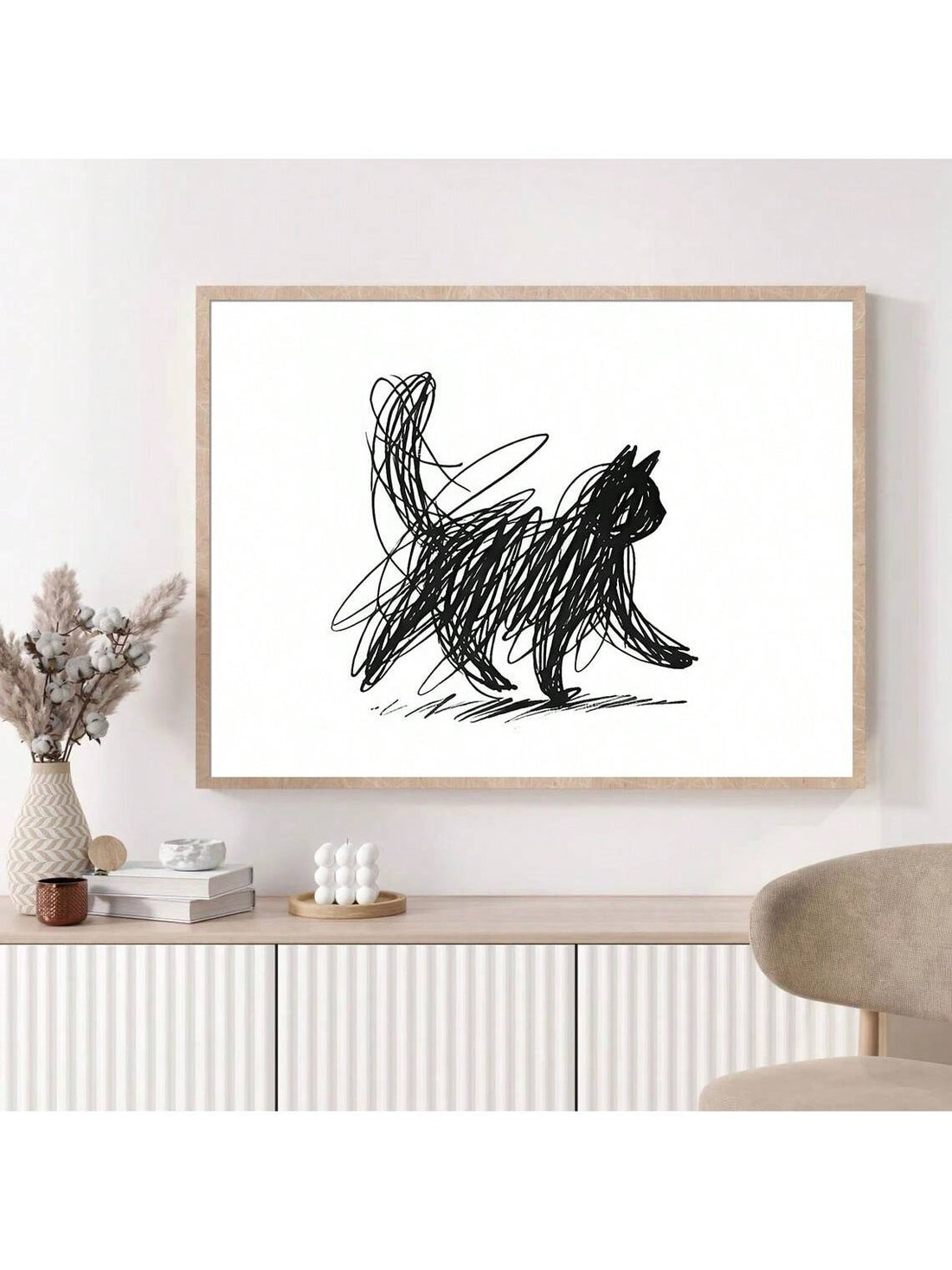 Celebrate your love for cats with this playful Minimalist Cat Scribble Wall Art Poster. Its simple, modern lines capture your feline friend's charm in a fun and stylish way, perfect for brightening any space. Whether in your living room, bedroom, or office, this canvas print adds a touch of whimsy and a contemporary vibe that cat lovers will adore.