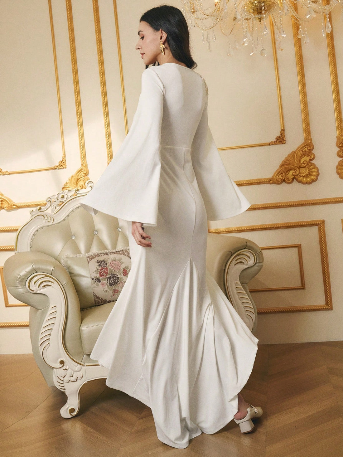 Elevate your winter wardrobe with this stunning white long sleeve dress, where timeless elegance meets modern flair. The intricate applique detailing adds a touch of sophistication and visual interest, making it the perfect choice for holiday parties, special celebrations, and memorable evenings. Crafted for comfort and style, this dress flatters the figure while keeping you warm through the season. Whether you're dancing at a festive gathering or making a grand entrance, this versatile piece transitions ef