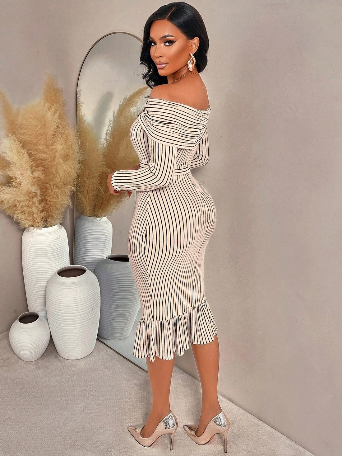 Step into fall and winter with this chic off-shoulder striped midi dress that blends elegance and comfort effortlessly. Its flattering neckline adds a flirty touch, while the classic stripes keep things timeless. Perfect for your daily commute or after-work plans, this dress pairs easily with boots or heels to keep you stylish through cooler days. Embrace effortless charm and cozy sophistication in one playful, must-have piece!