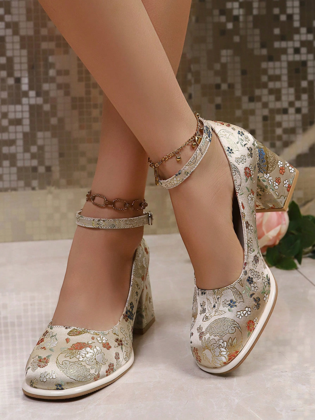 Step into the spotlight with these stunning embroidered high heels that blend elegance with eye-catching flair. Featuring intricate embroidery details and a sturdy thick heel, these beauties deliver both comfort and confidence for any special occasion. Whether you're dancing the night away at a party or making a grand entrance, the unique design ensures all eyes stay on your feet. Slip them on and let your style do the talking!