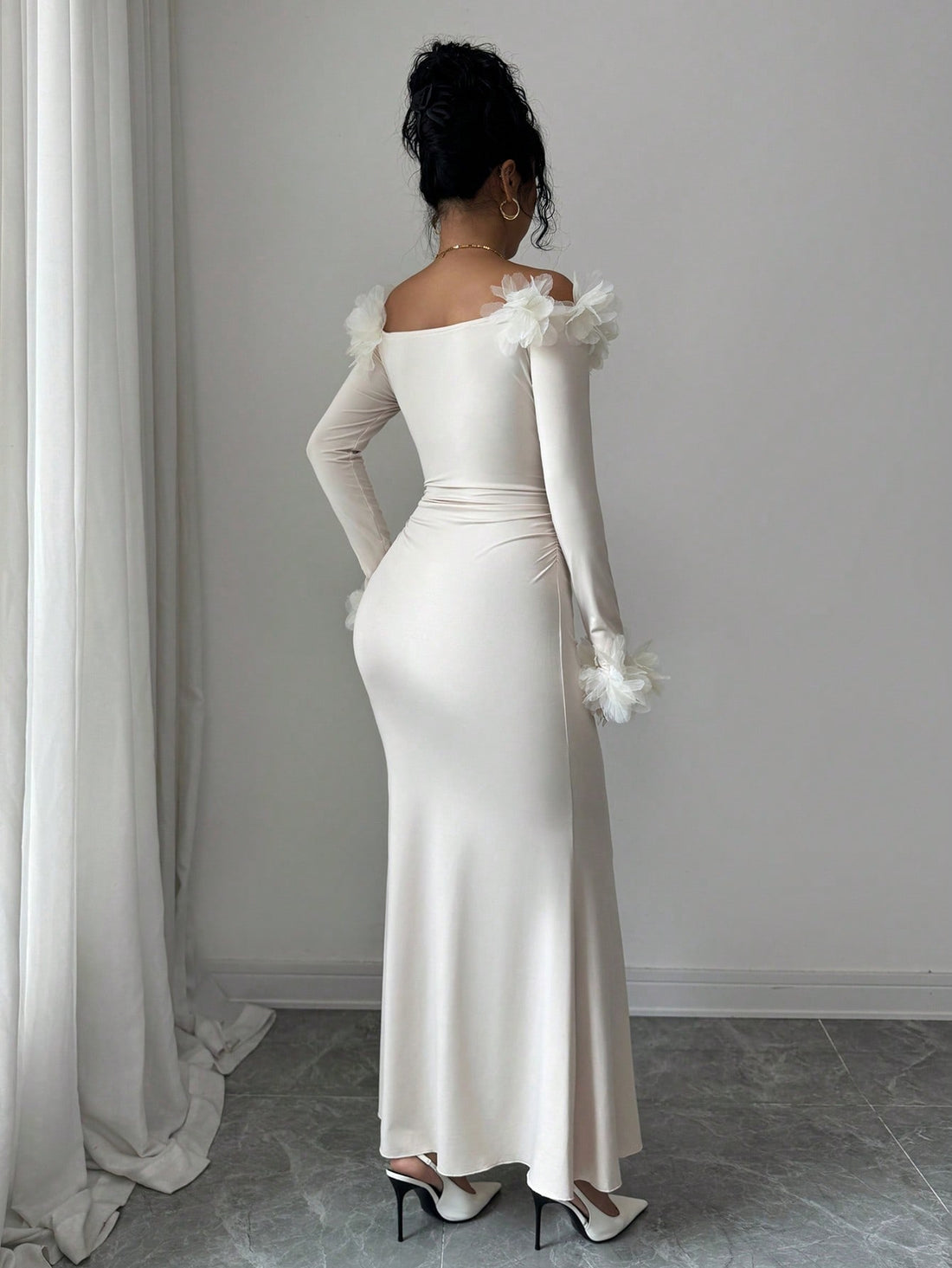 Discover effortless elegance with this stunning off-shoulder knit dress, where cozy comfort meets fashion-forward style. The delicate 3D floral accents add a whimsical touch that catches every eye, while the soft knit fabric keeps you warm and wonderfully comfortable through autumn and winter. Perfect for date nights, holiday gatherings, or whenever you want to feel absolutely fabulous. This dress proves that staying chic doesn't mean sacrificing comfort—slip it on and let your style do the talking.