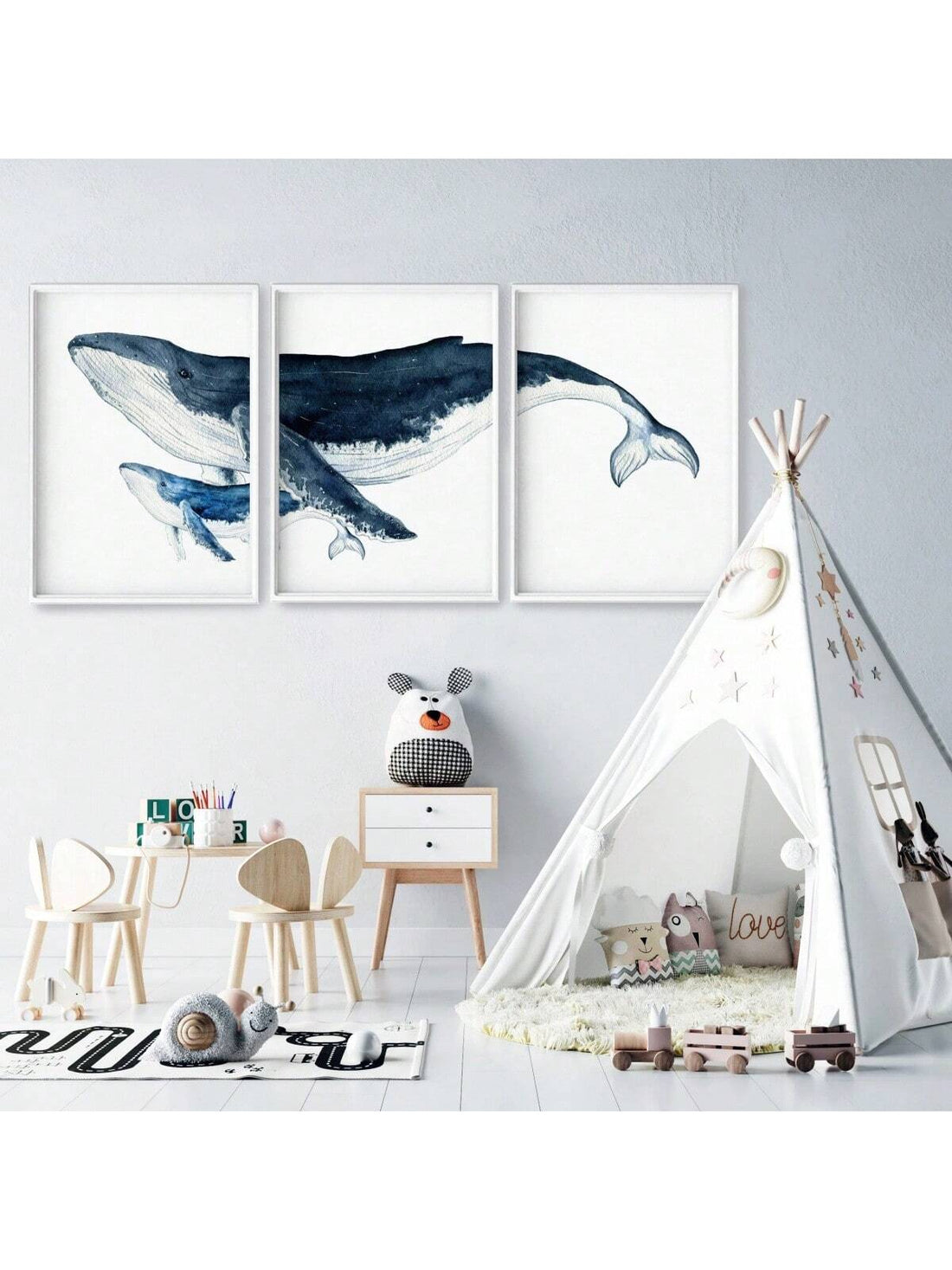 Dive into oceanic charm with this stunning three-piece canvas art set featuring majestic humpback whales rendered in soft watercolor hues. Perfect for coastal-inspired spaces, each canvas captures the graceful beauty of these gentle giants with artistic flair. The muted, sophisticated palette complements modern nautical décor while adding a touch of whimsy to any room. Whether you're a marine life enthusiast or simply love ocean-inspired aesthetics, this set transforms your walls into a serene underwater ga