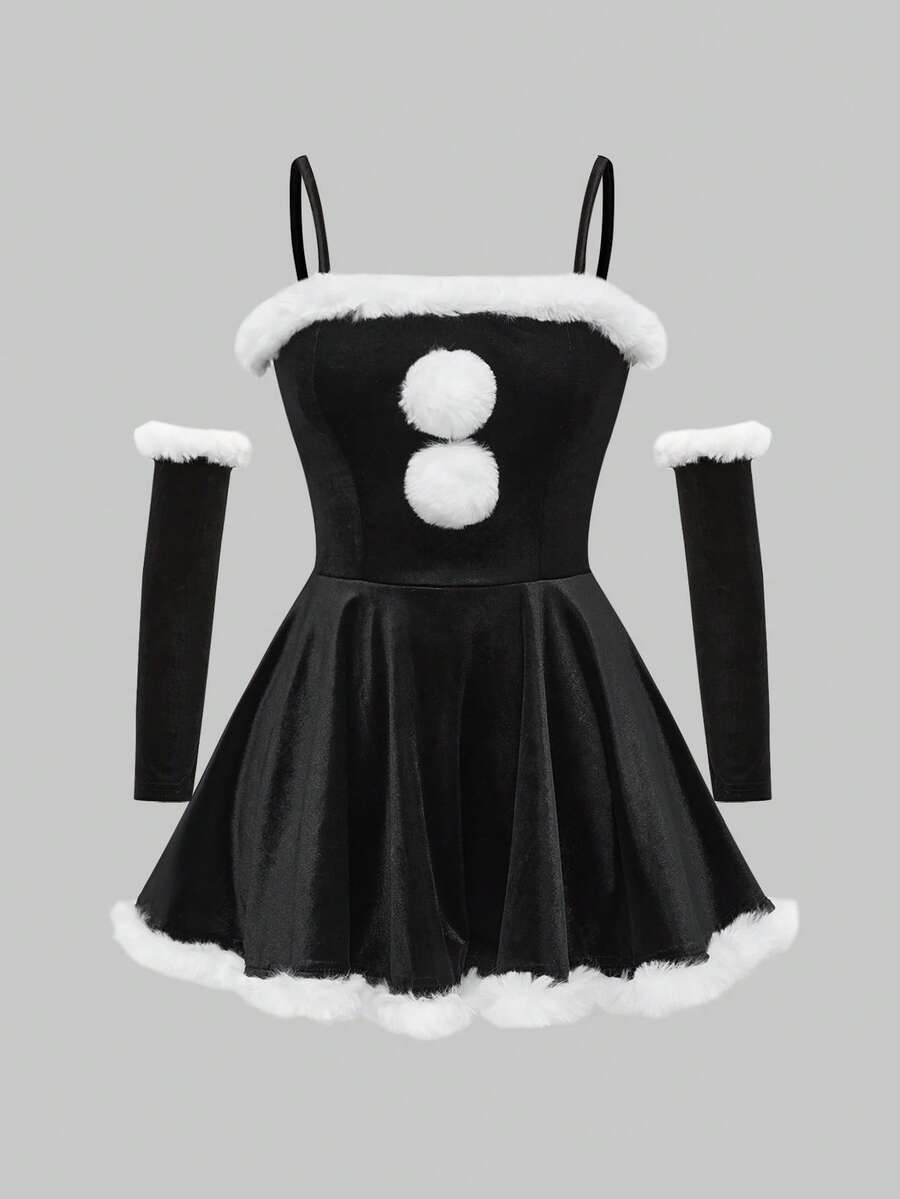 Front product view of black spaghetti strap mini dress with white faux fur trim and pom poms