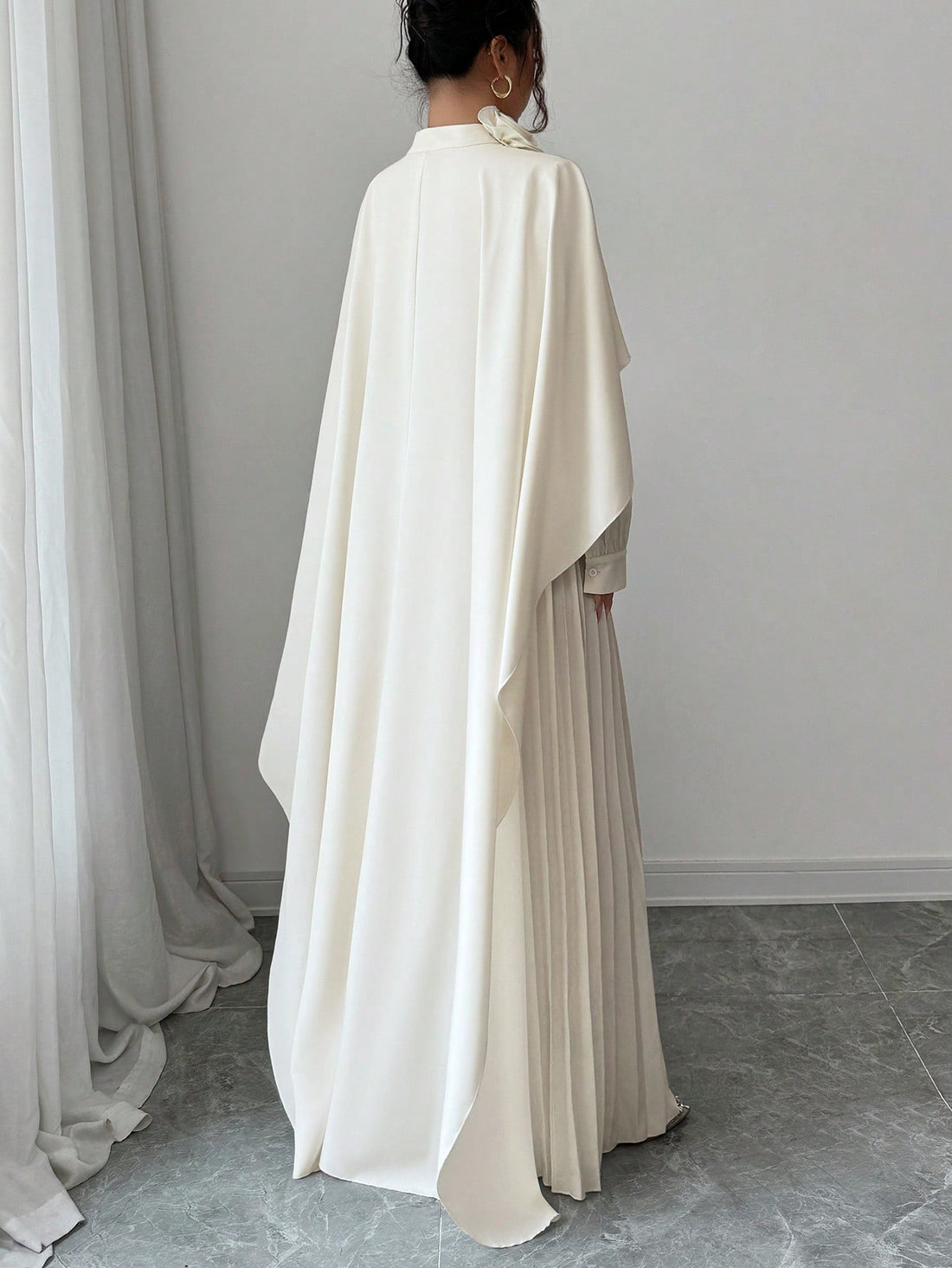 Make a statement with this stunning Elenzga 2-piece set that transforms your everyday wardrobe into something extraordinary. The luxe shawl collar top pairs perfectly with the eye-catching 3D floral wide-leg jumpsuit, creating an effortlessly chic ensemble that works for brunch, date night, or any occasion demanding a little extra pizzazz. The flowing silhouette flatters every figure while the dimensional florals add depth and visual interest. Whether you're channeling your inner fashionista or just ready t