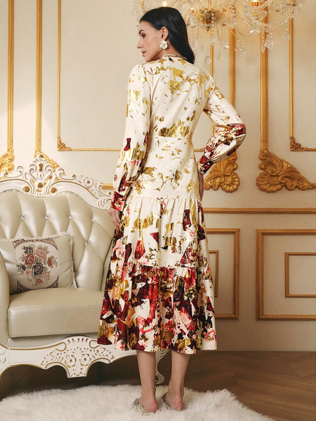 Make a statement at your next soirée in this stunning V-neck maxi dress, where shimmering gold prints dance across luxurious fabric. The flattering silhouette and elegant draping create an effortlessly sophisticated look that transitions seamlessly from holiday galas to upscale evening events. Perfect for anyone who wants to turn heads while feeling absolutely fabulous—because celebrating in style should always be this much fun!