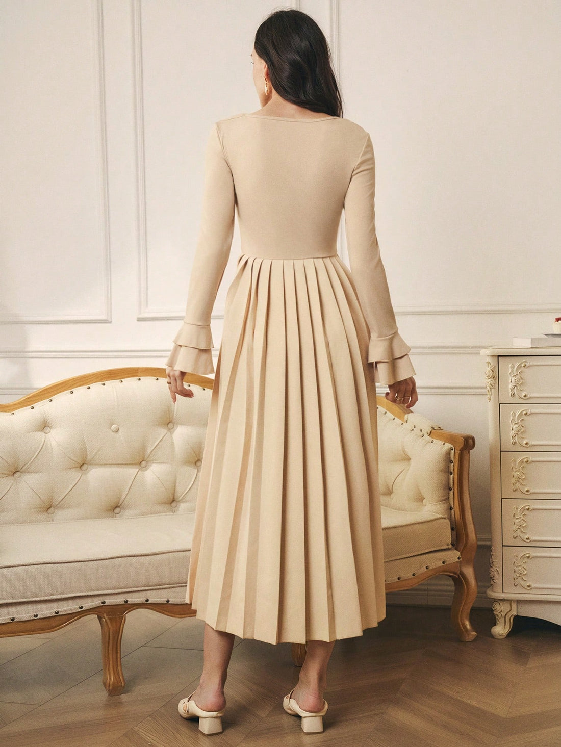 Elevate your style with our Elegant Patchwork Pleated Dress. Perfect for any occasion, the metal decor collar adds a touch of sophistication while the versatile layering easily transitions from day to night. Dress up or down with ease, this dress will have you looking chic and confident!