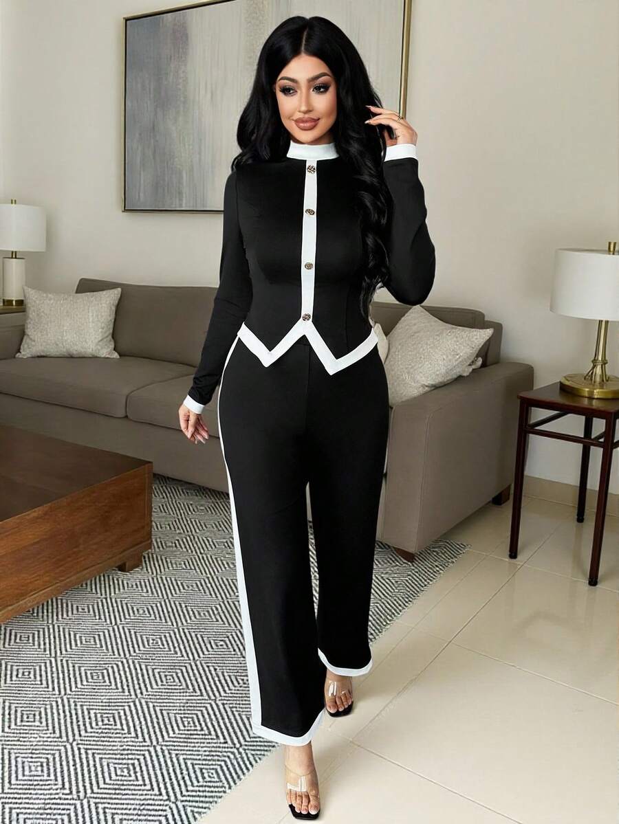 Experience the breathtaking fusion of mid-century sartorial heritage and sharp, modern architectural tailoring. This stunning contrast color-block ensemble is meticulously designed for the woman who values a high-fashion, "quiet luxury" approach to seasonal dressing—the ultimate centerpiece for prestigious business meetings, exclusive autumn retreats, and high-authority urban events.