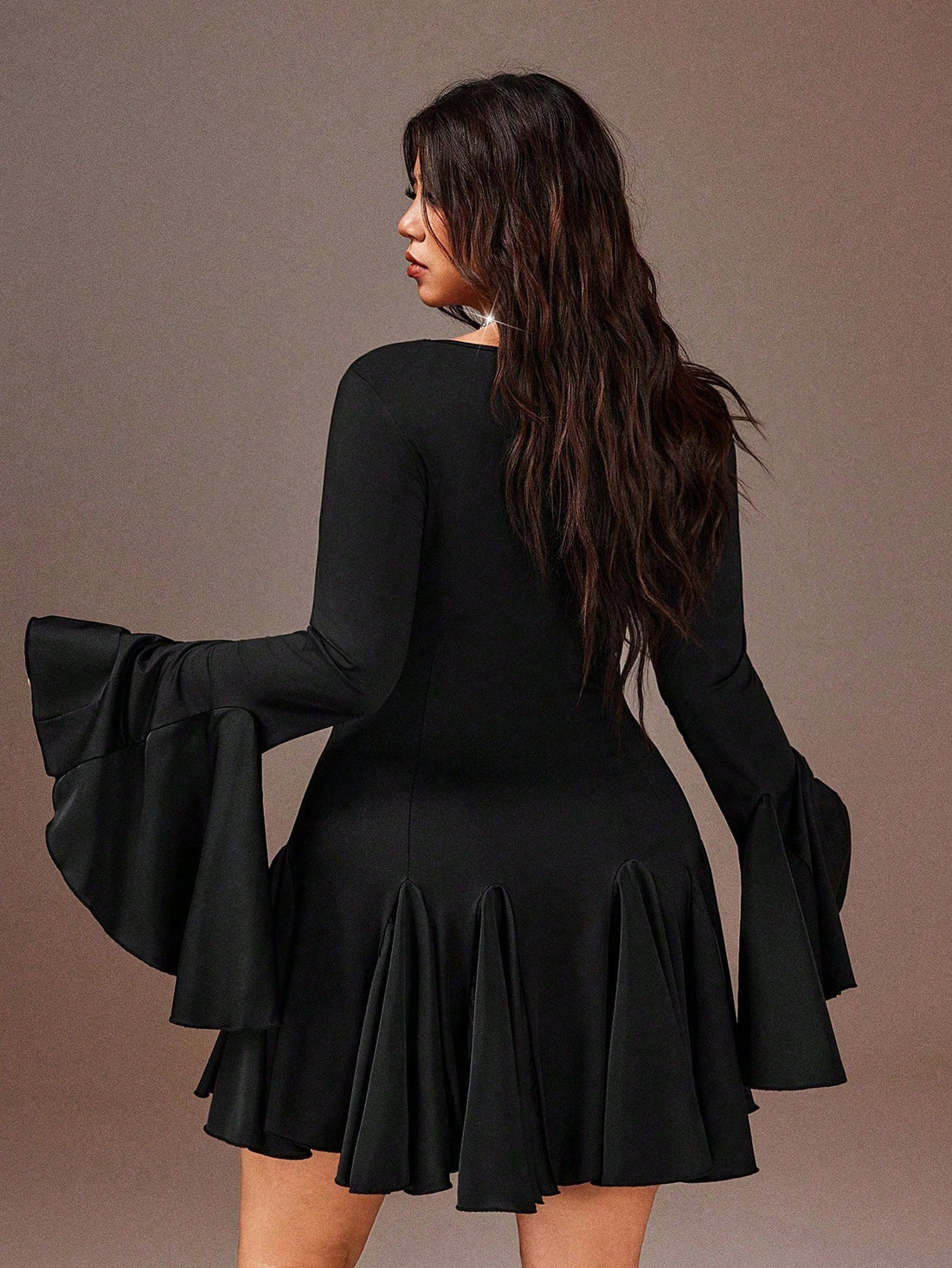 Turn heads at your next event in this stunning bodycon mini dress designed for curves. Crafted from high-stretch polyester, it hugs your silhouette beautifully while offering comfort and movement. The cinched waist creates an hourglass effect, while playful ruffle hem details and patchwork accents add personality and flair. Available in plus sizes, this elegant piece transitions effortlessly from party to night out. Slip it on and feel confident, sexy, and absolutely fabulous.