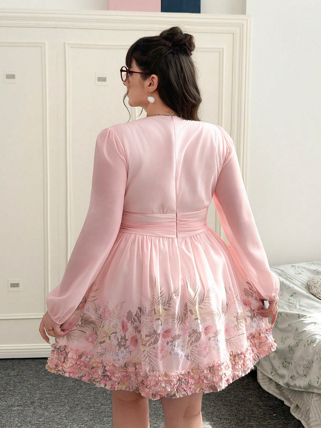 Elevate your date night or party look with this charming plus-size dress that celebrates your curves in all the right ways. The romantic floral print brings a touch of garden-fresh elegance, while the flattering V-neckline draws attention upward with grace. Delicate ruffles at the hem add playful movement and dimension, creating a silhouette that's both sophisticated and fun. Perfect for making a memorable entrance at any special occasion, this dress combines comfort with undeniable style—because looking fa