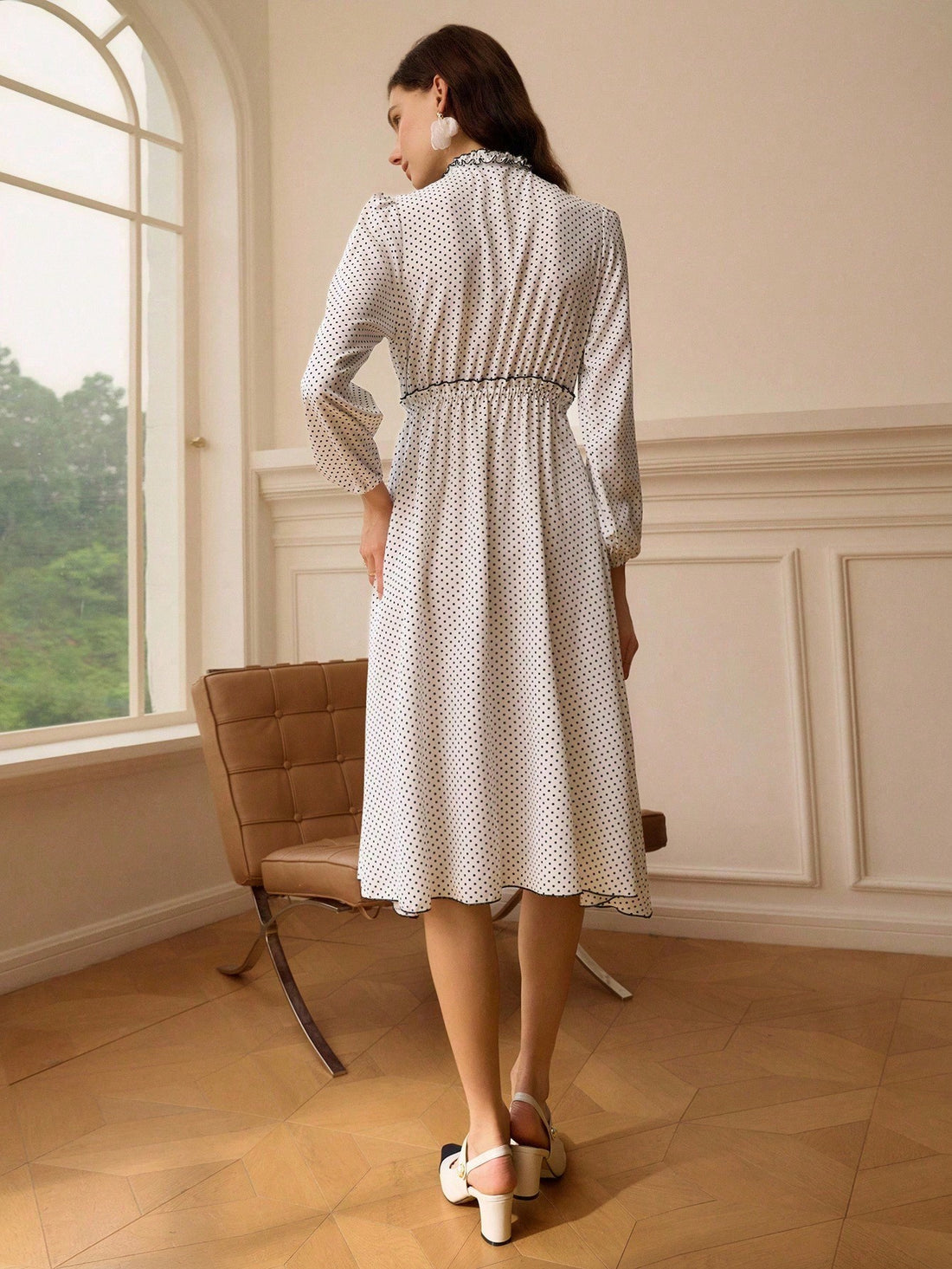 Make a statement with this charming polka dot long sleeve dress that effortlessly blends timeless style with modern flair. The classic dot pattern adds a touch of whimsy while the long sleeves provide versatile coverage for any season. Perfect for brunch dates, office days, or evening outings, this dress transitions seamlessly from casual to dressed-up with just a change of accessories. The flattering silhouette and playful design ensure you'll feel confident and fabulous no matter where the day takes you.