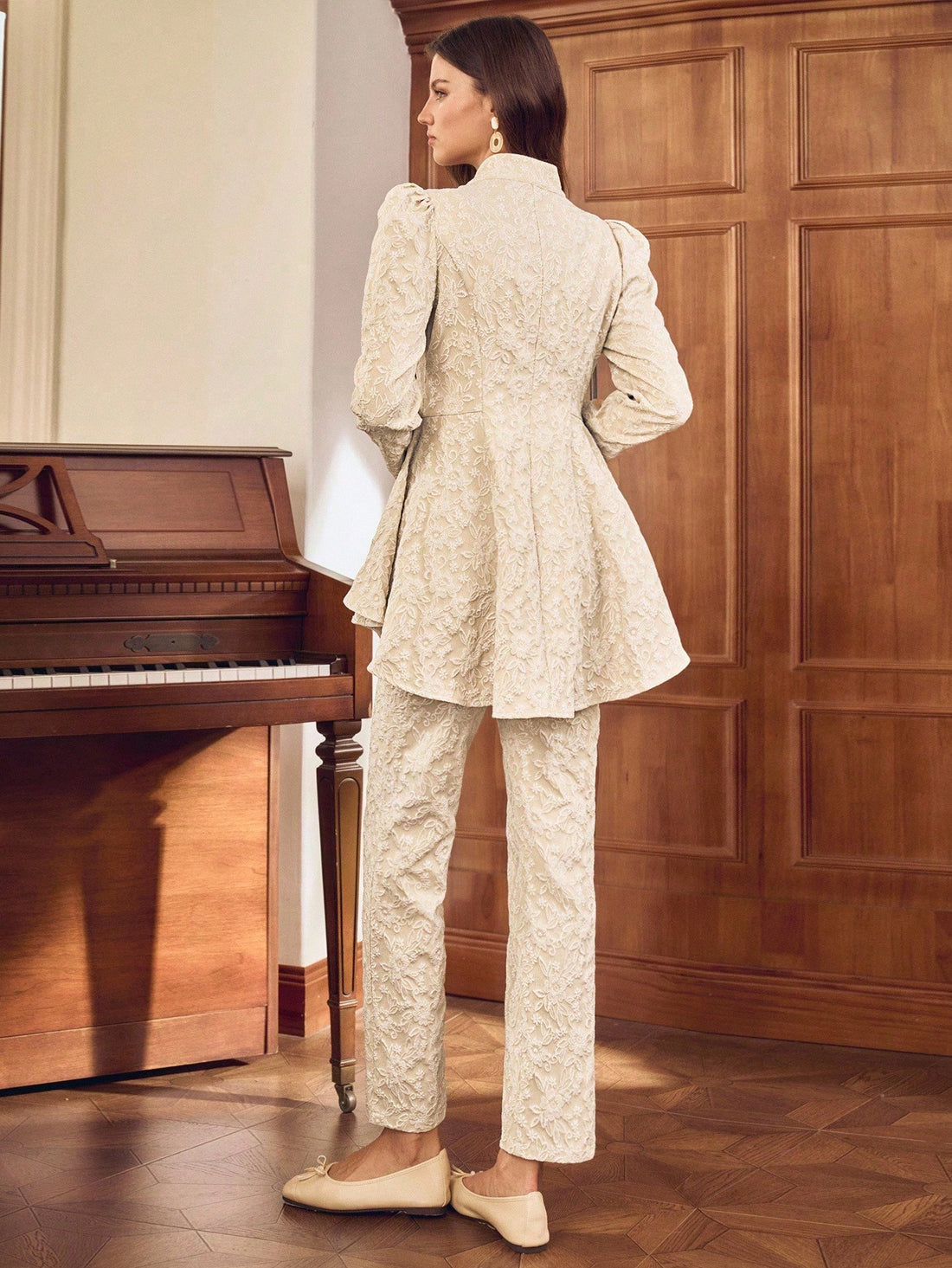 Upgrade your wardrobe with our Elegant Minimalist Women’s Two-Piece Outfit. This set includes a stylish long sleeve top and matching pants, both designed with a cinched waist for a flattering fit. Perfect for any occasion, this outfit effortlessly combines elegance and simplicity. Dress to impress with this must-have set!