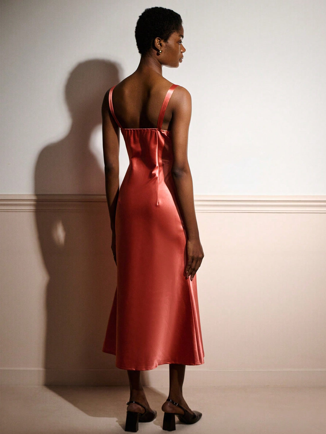 Slip into sophistication with this stunning satin midi dress that's ready to steal the show. The luxe fabric drapes beautifully while the charming bow detail adds a flirty touch that'll have everyone asking where you got it. Whether you're celebrating a wedding, hitting a party, or just feeling fancy, this dress delivers effortless elegance. The midi length keeps things classy while the silky finish catches the light just right. Your go-to piece for making a memorable entrance!