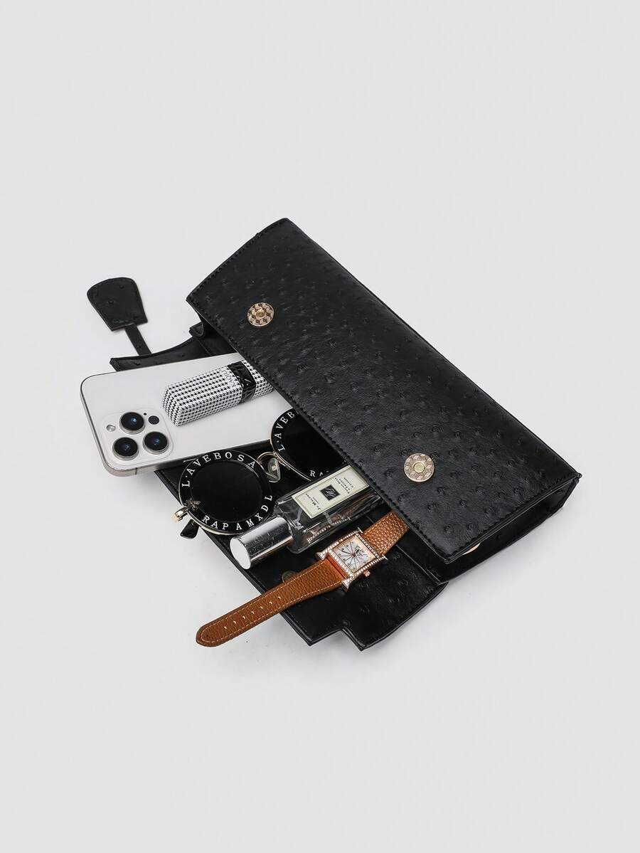 Ostrich embossed structured top handle shoulder bag with flap closure and adjustable strap