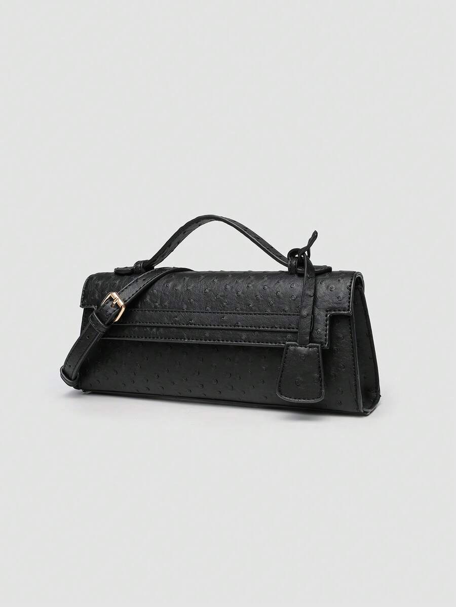 Ostrich embossed structured top handle shoulder bag with flap closure and adjustable strap