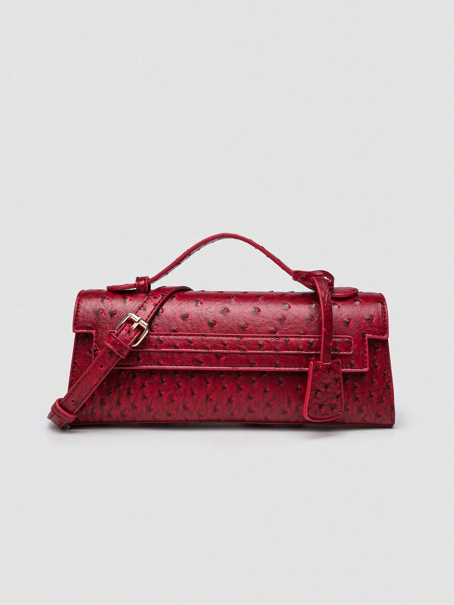 Ostrich embossed structured top handle shoulder bag with flap closure and adjustable strap