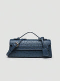 Ostrich embossed structured top handle shoulder bag with flap closure and adjustable strap