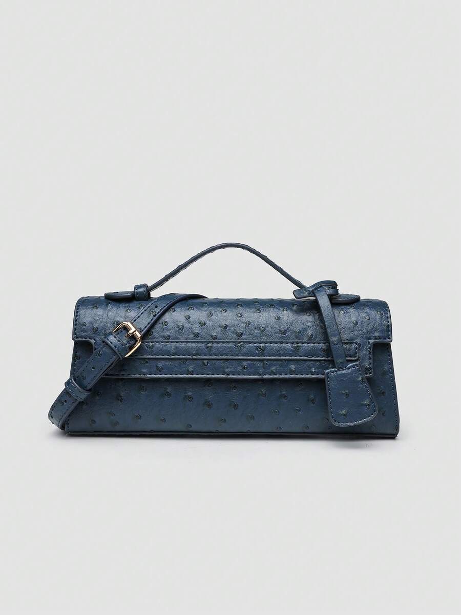 Ostrich embossed structured top handle shoulder bag with flap closure and adjustable strap