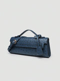 Ostrich embossed structured top handle shoulder bag with flap closure and adjustable strap