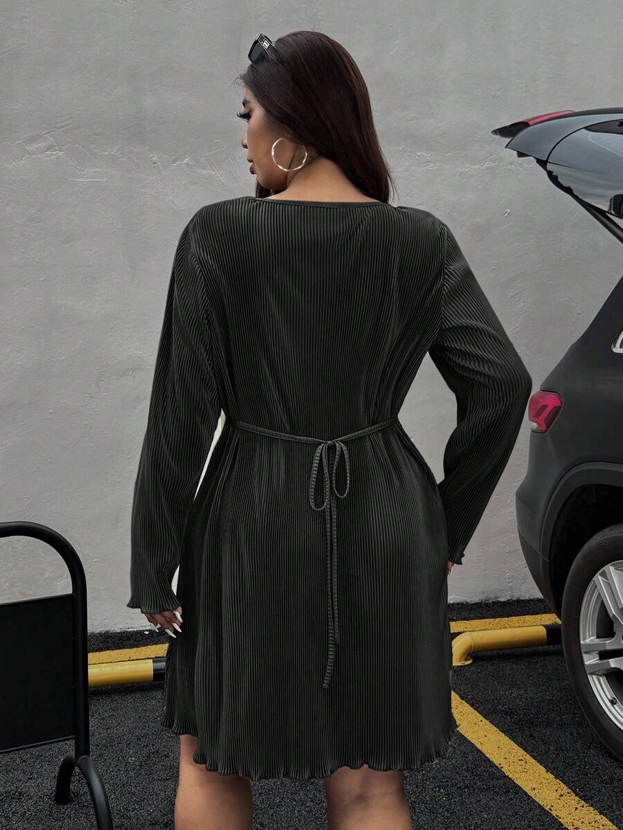 Elevate your wardrobe with this charming plus-size dress that's equal parts comfort and style! The solid color keeps things timeless while the playful lettuce hem adds a flirty touch that catches every eye. Cinch it at the waist with the adjustable tie to create your perfect silhouette—because fashion should feel as good as it looks. Whether you're heading out for brunch or a casual night out, this short dress is your go-to piece for looking effortlessly put-together. Celebrate your curves in a design that'