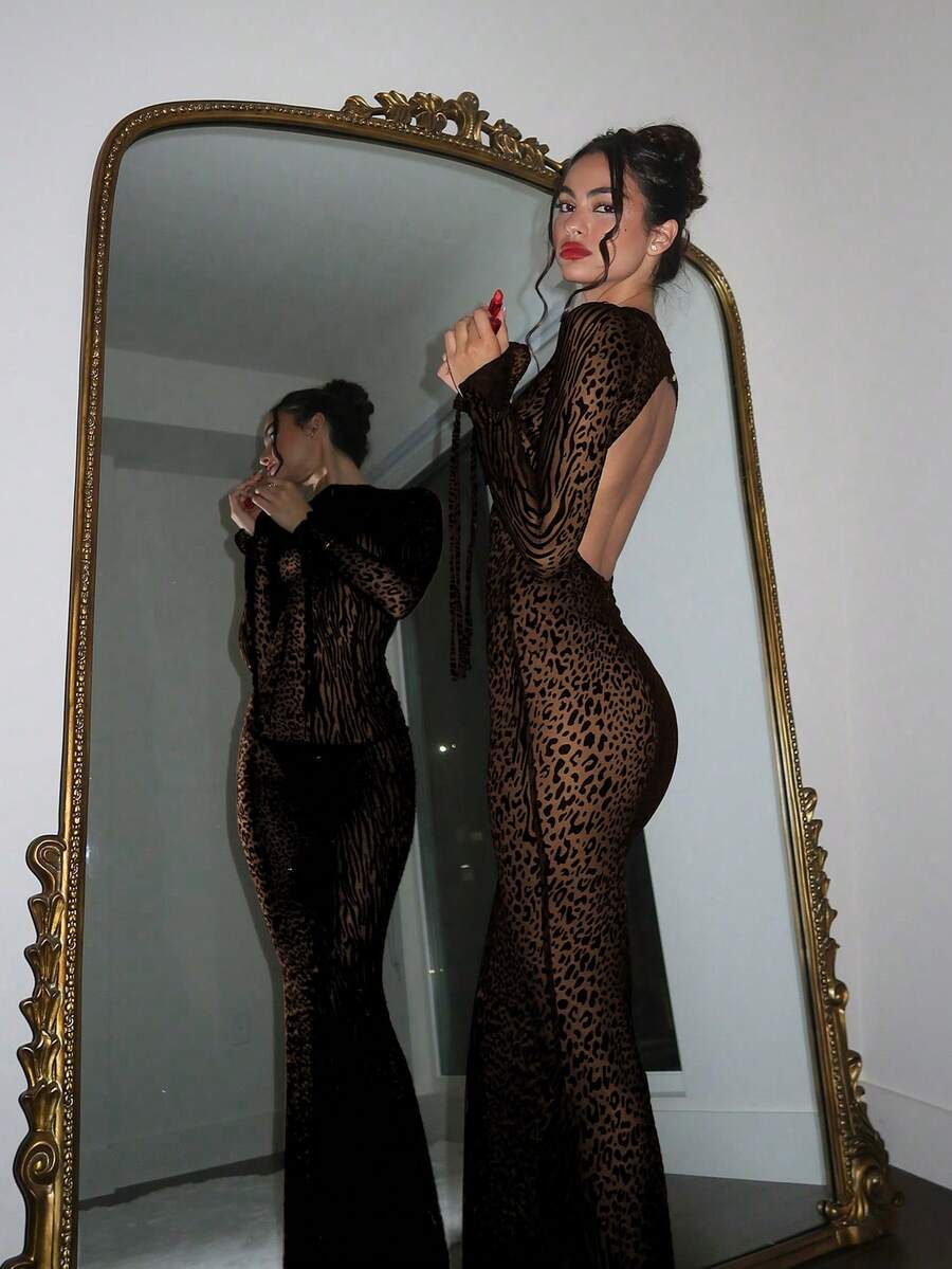 Turn heads in this stunning leopard print long sleeve dress that strikes the perfect balance between bold and sophisticated. The timeless animal pattern adds instant edge to your wardrobe, while the flattering silhouette keeps things undeniably chic. Long sleeves provide elegant coverage without sacrificing that show-stopping appeal. Whether you're heading to a night out or elevating your everyday style, this dress delivers confidence with every wear. A versatile piece that proves leopard print is always in