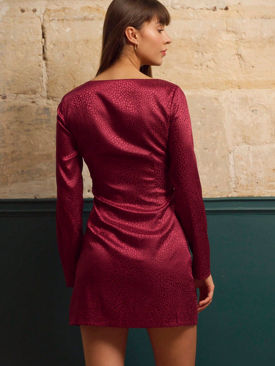 Turn heads this season in our stunning burgundy jacquard satin mini dress! The fitted silhouette hugs your curves in all the right ways, while the cheeky keyhole cut-out adds just the right amount of flirtation. Rich jewel tones and luxe satin fabric make this your go-to pick for autumn soirées, holiday parties, and any occasion calling for a touch of glamour. Dress it up with heels and statement jewelry, or keep it playfully casual—this versatile number does it all.