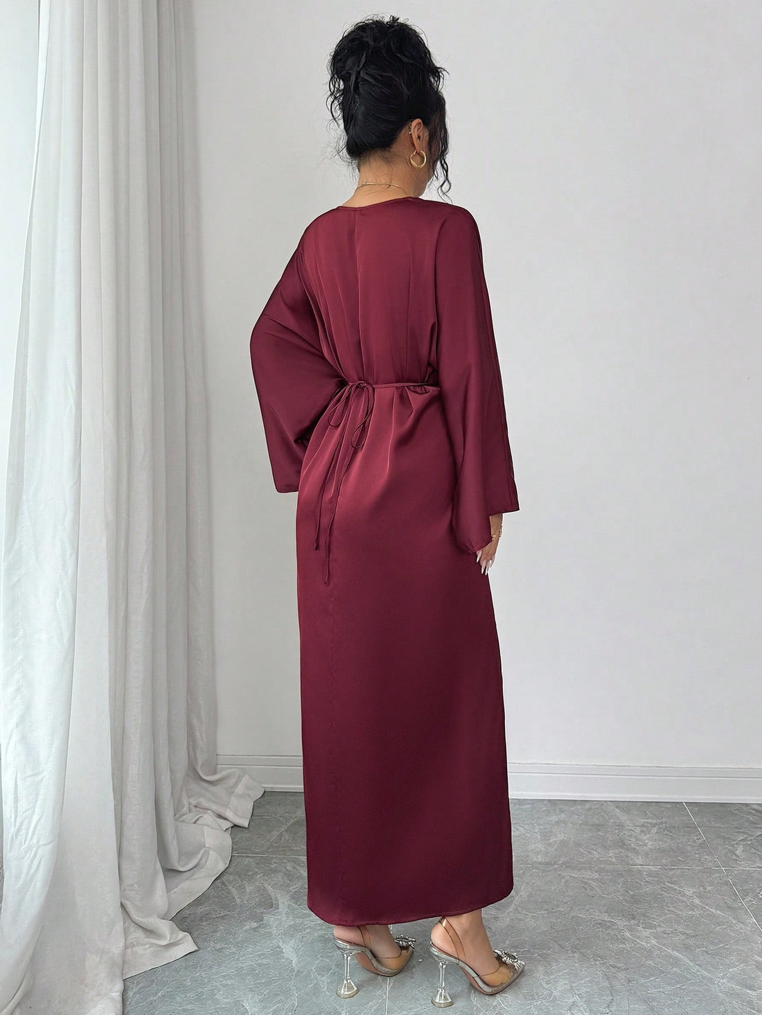 Make a statement this season in our stunning red maxi dress—the ultimate showstopper for holiday gatherings and New Year's bashes. Crafted with elegance in mind, this dress features a flattering silhouette that moves beautifully with every step. The rich crimson hue commands attention while the flowing maxi length adds sophistication and grace. Whether you're dancing at a Christmas party or ringing in 2026 with style, this versatile piece transitions effortlessly from festive celebrations to special occasio