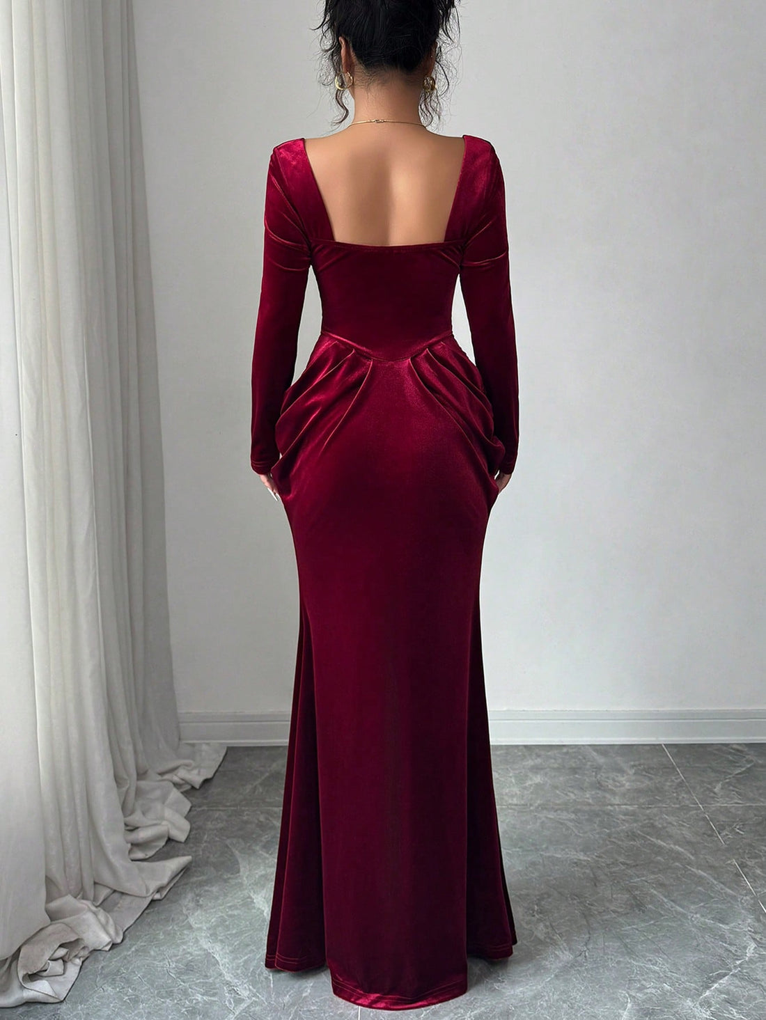 Slip into pure holiday magic with this stunning velvet maxi dress that's ready to turn heads at every celebration. The chic square neckline frames your shoulders beautifully, while the luxurious velvet fabric drapes like a dream. A playful ruffle hem adds just the right amount of flair and movement, making every twirl feel special. Perfect for festive parties, elegant dinners, or any occasion that calls for a touch of glamour. This dress is your ticket to feeling absolutely fabulous from the moment you put 