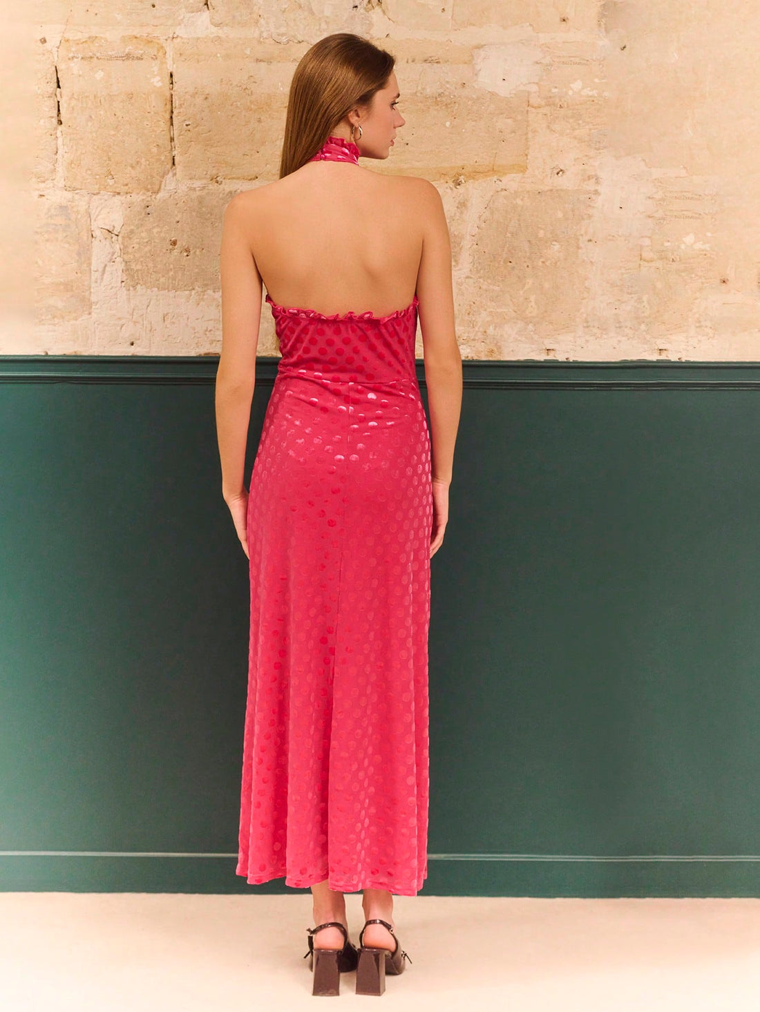 Turn heads in this stunning fuchsia satin maxi dress that's pure magic! The playful polka dot pattern adds a fun twist, while the elegant halter neck and daring open back create serious wow-factor. Silky smooth satin drapes beautifully, making you feel like the star of any occasion—whether you're hitting a party, date night, or special event. This dress effortlessly balances chic sophistication with flirty charm, proving that looking fabulous doesn't have to be complicated. Slip it on and let your confidenc