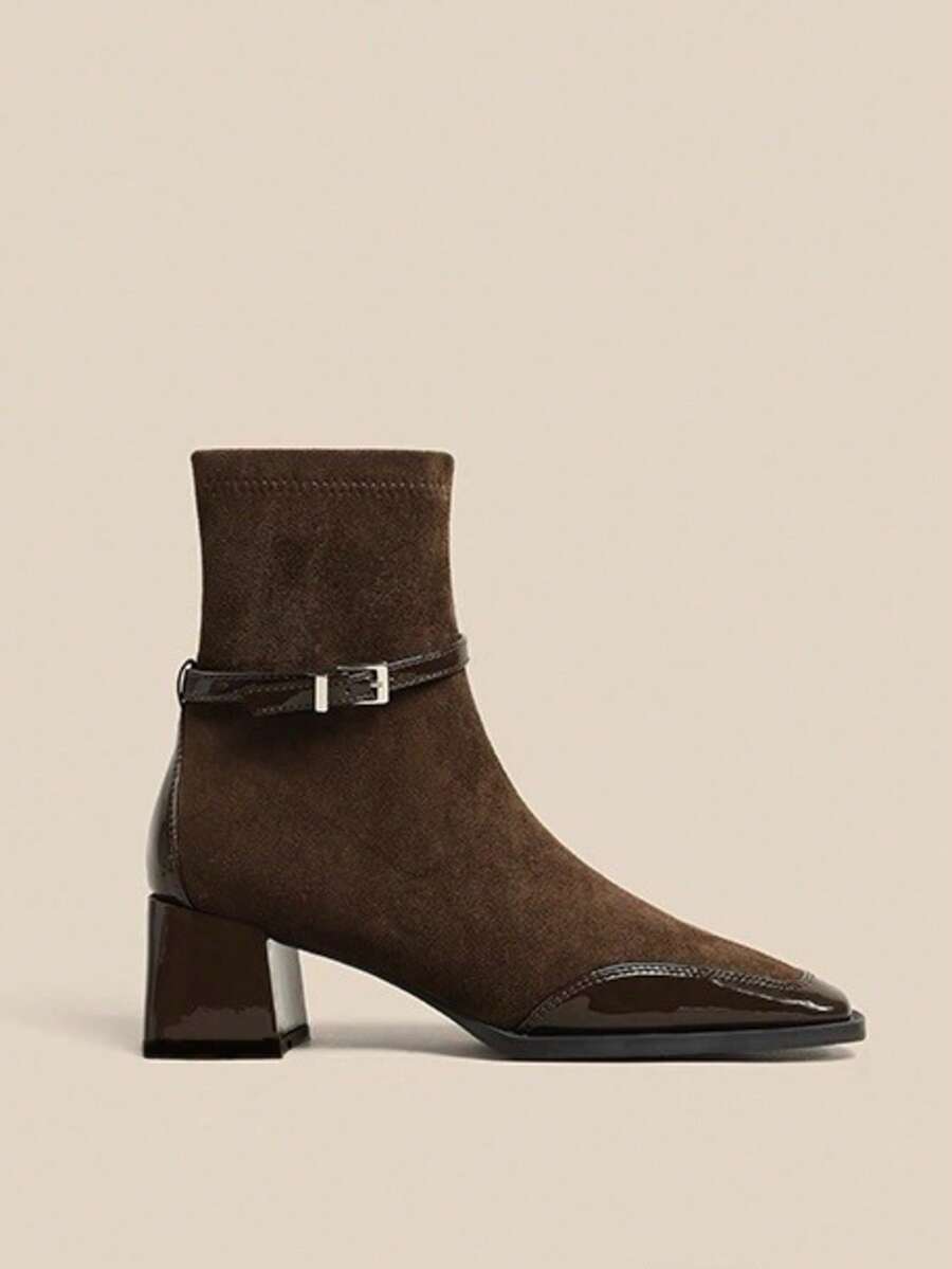 Step into timeless elegance with these show-stopping wine red boots that blend vintage charm with modern edge. Featuring a sturdy chunky heel for all-day comfort and confidence, these short boots showcase classic French-British styling that never goes out of fashion. The convenient side zipper makes slipping them on effortless, while the decorative buckle strap adds that perfect touch of retro flair. Whether you're channeling 70s vibes or adding a sophisticated pop of color to your everyday look, these vers