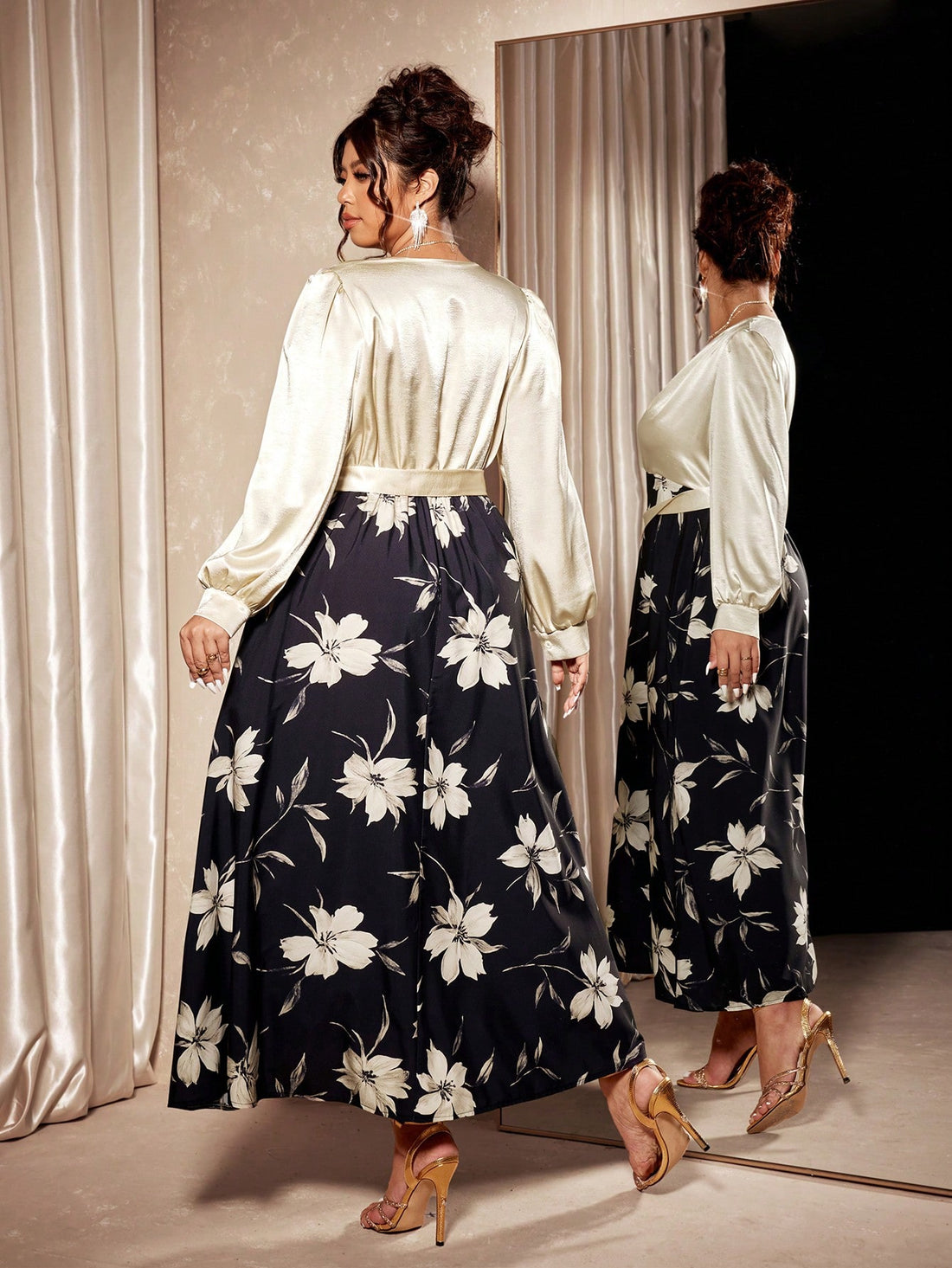 Slip into sophistication with this stunning plus-size satin maxi dress! Featuring a gorgeous floral print that dances across luxurious fabric, this showstopper pairs timeless elegance with modern flair. The adjustable tied waist creates a flattering silhouette while adding a touch of playful charm. Perfect for parties, special occasions, or whenever you want to feel absolutely fabulous. Embrace your curves and turn heads in a dress designed to celebrate you.