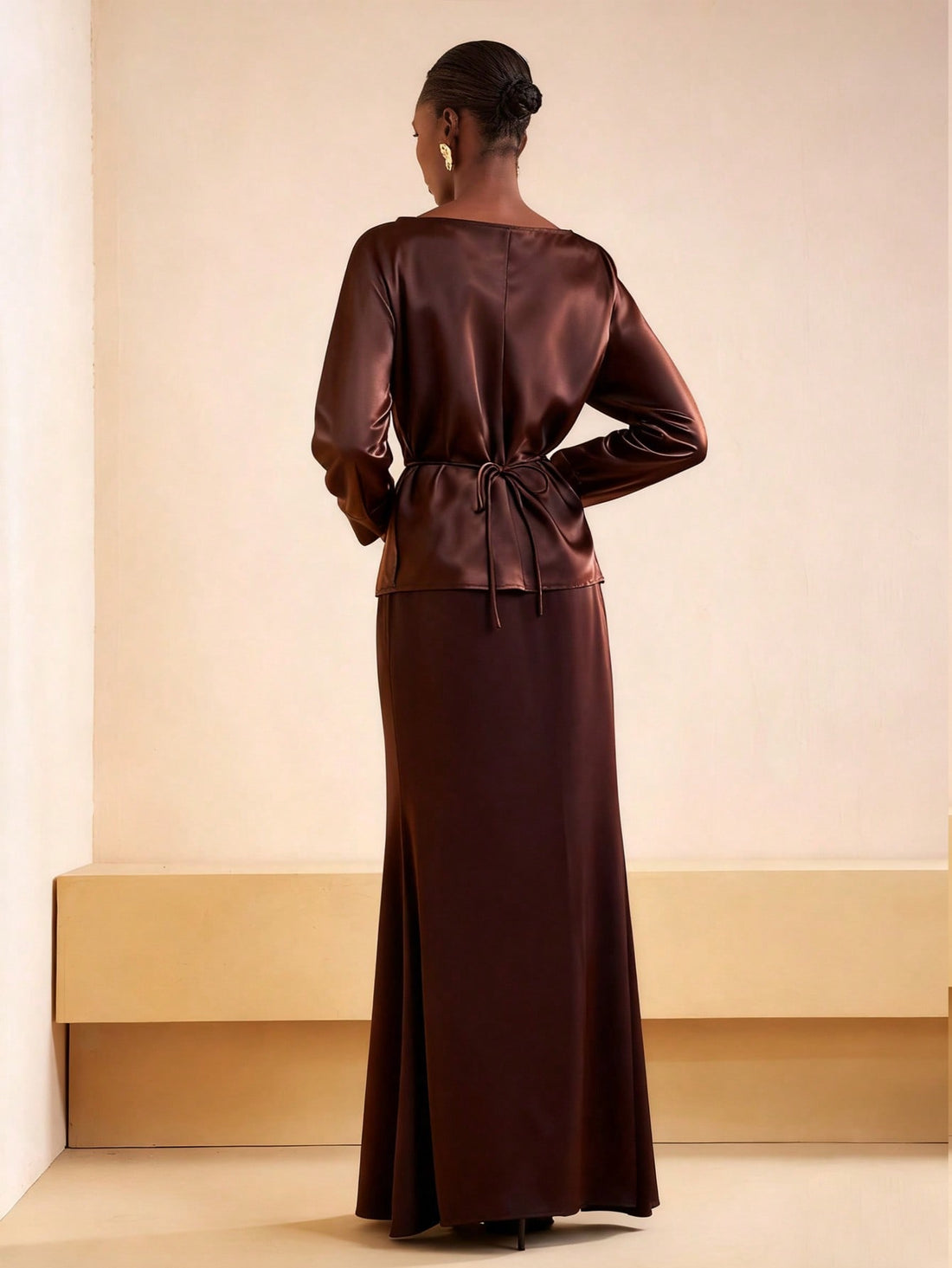 Elevate your wardrobe with this stunning burgundy two-piece set that does the heavy lifting for you! The flattering V-neck wrap top cinches at just the right spot, while the sleek straight skirt skims your silhouette beautifully. Whether you're toasting at a wedding, brunching with friends, or keeping it casual on the weekend, this versatile duo transitions seamlessly from occasion to everyday. The rich burgundy hue pairs with practically everything in your closet, making it the go-to set you'll reach for a