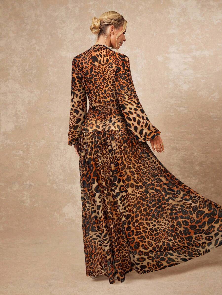 Unleash your wild side with this stunning leopard print maxi dress that's equal parts sophisticated and fun. Featuring elegantly layered construction, this versatile piece transitions seamlessly from fall weddings to weekend festivals. The flowing silhouette flatters every frame while the timeless leopard pattern adds an instant dose of personality. Whether you're dancing at a party or celebrating in style, this dress is your go-to for making a memorable entrance. Comfort meets glamour in one irresistible p