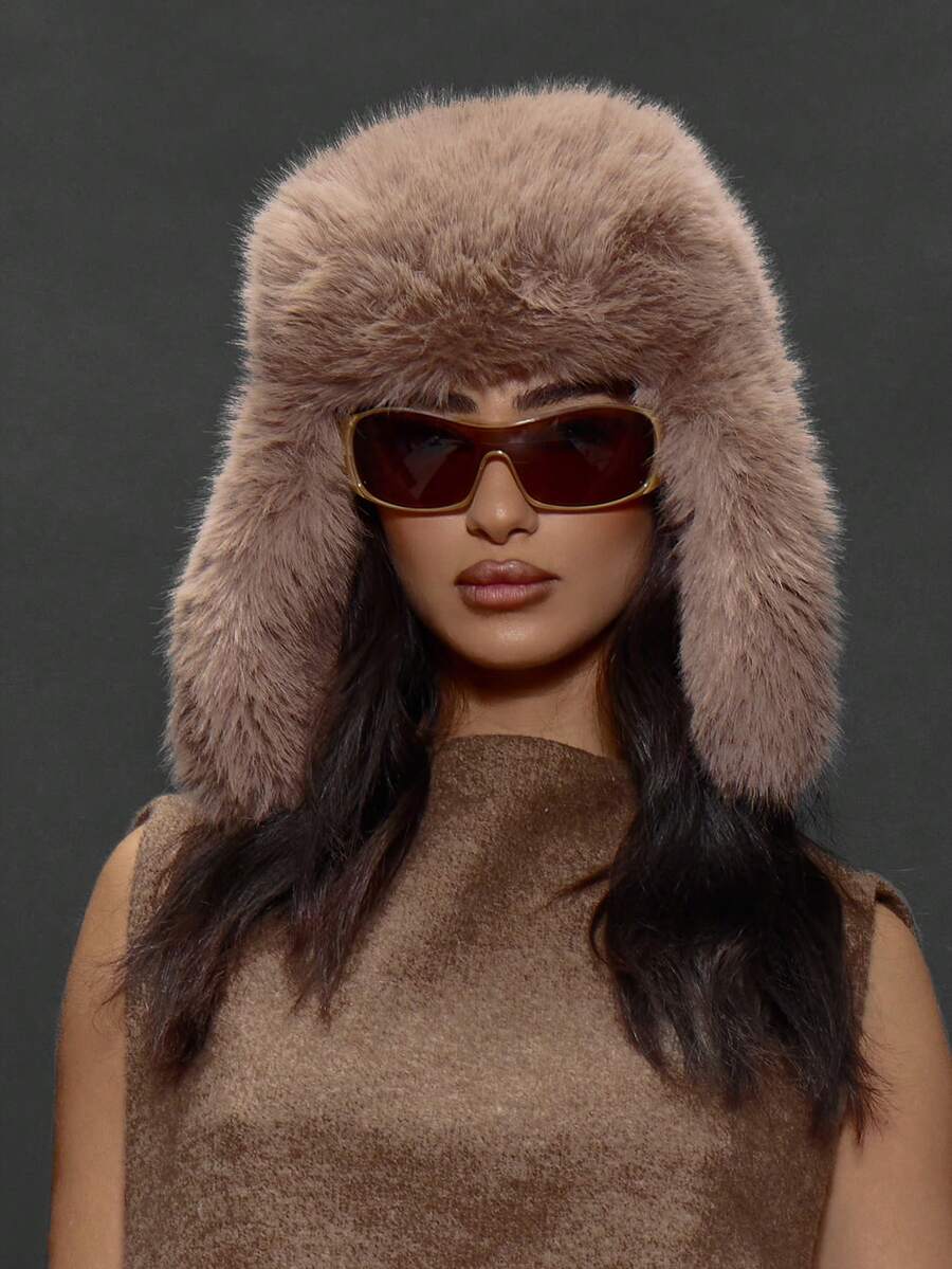 Taupe faux fur trapper hat with long ear flaps and thick front band