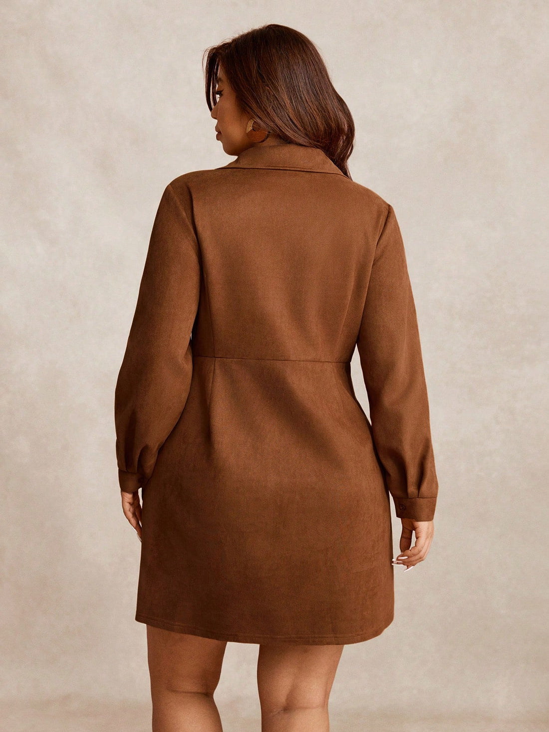 Saddle up in style with this plus-size Western cowgirl dress that brings authentic frontier flair to your wardrobe. Crafted from rich brown suede, this showstopper features a classic shirt collar and long sleeves for that true rodeo-ready look. Perfect for country concerts, themed parties, or anyone who wants to channel their inner cowgirl with confidence and comfort. Embrace your bold, adventurous spirit in a dress that's as unique and fearless as you are.