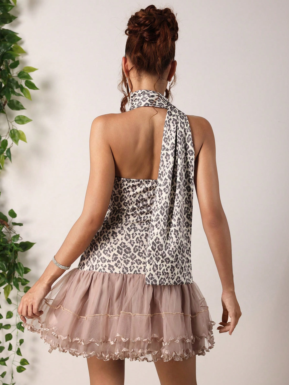 Step into the spotlight with this show-stopping leopard print patchwork dress that blends wild style with sophisticated charm. Featuring a dynamic mix of prints and textures, this short dress delivers instant glamour for holiday parties and special occasions. The playful patchwork design keeps things fresh and fashion-forward, while the flattering silhouette ensures you'll feel confident and fabulous all night long. Perfect for anyone ready to make a bold statement without taking themselves too seriously.