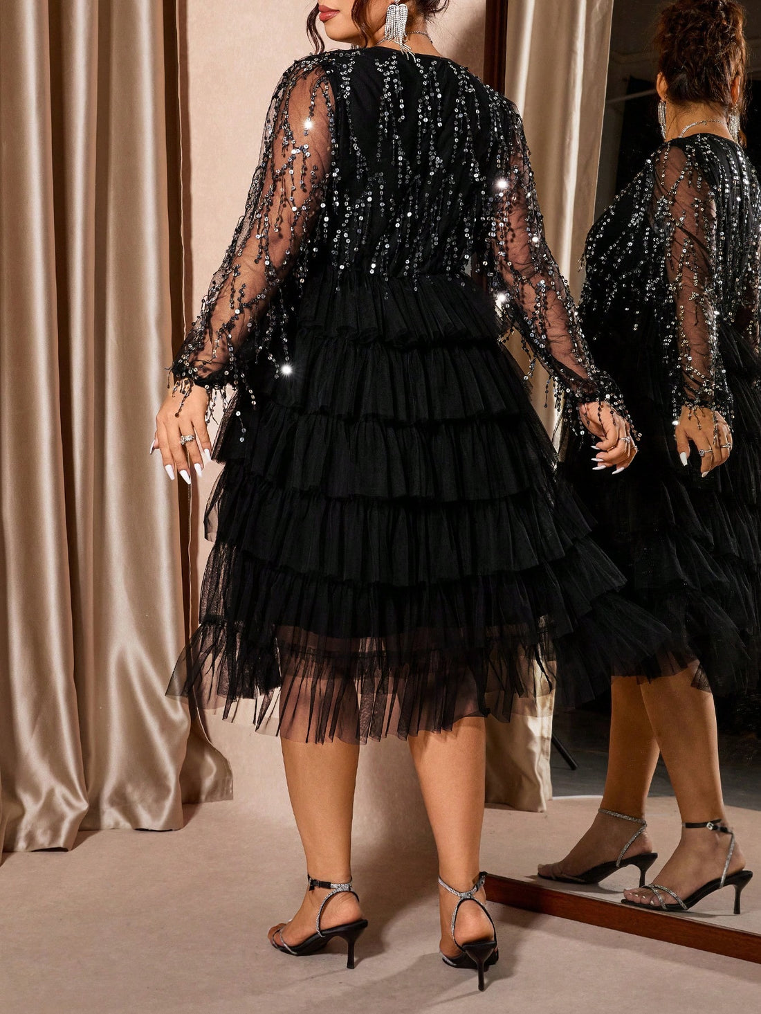 Dazzle this holiday season in a dress that's pure magic! This plus-size sequin stunner features a sheer V-neckline and long sleeves that blend elegance with festive flair. The all-over sequin detailing catches the light with every move, making you the star of any celebration. Perfect for Christmas parties, New Year's Eve, or any occasion calling for show-stopping glamour. Slip into confidence and let your sparkle shine!
