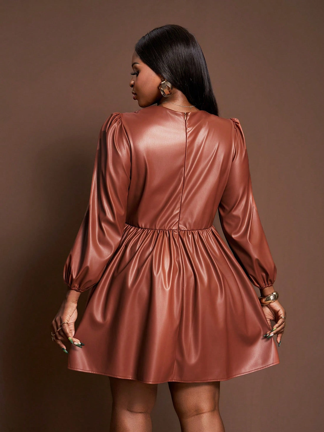 Turn heads with this Chic Plus Size V-Neck PU Leather Dress, designed to flaunt your style with a playful edge. The sleek PU leather adds a bold vibe while the lantern sleeves bring a touch of whimsy and elegance. Perfect for nights out or special occasions, this dress hugs your curves and lets your confidence shine bright. Embrace fashion that’s as fun as you are!