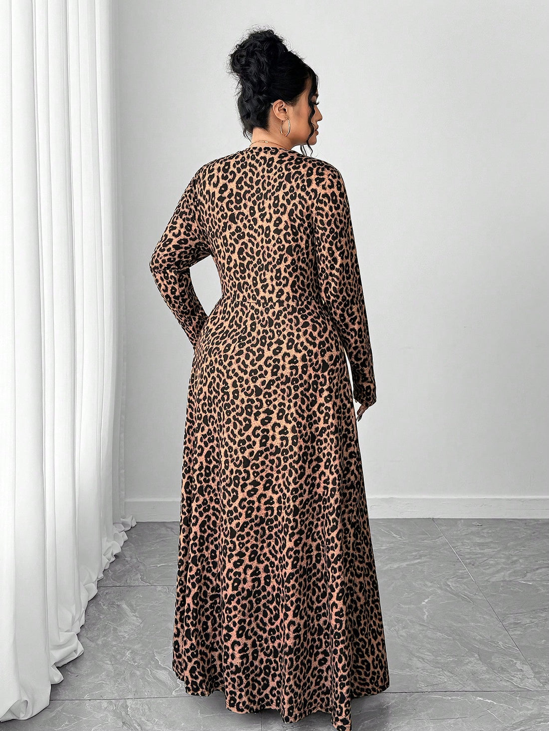 Unleash your wild side with this fabulous leopard print dress that's all about making a statement. Designed for the modern woman who refuses to blend in, this long-sleeve beauty combines comfort with undeniable style. The flowing silhouette flatters every curve while the classic leopard pattern adds that perfect touch of sass. Perfect for casual outings, weekend brunches, or whenever you want to feel confident and chic. Slip it on and let your personality roar.