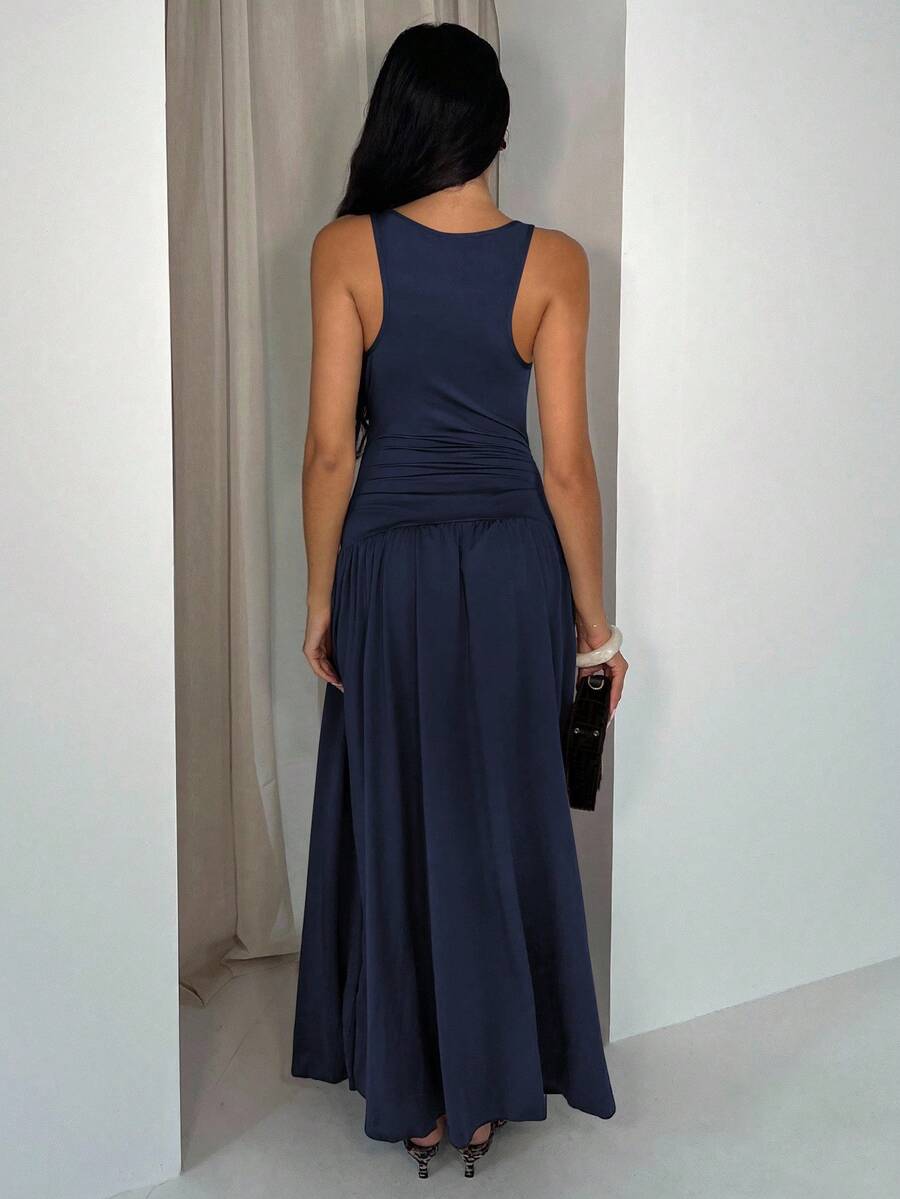 navy scoop neck tank maxi dress with wide straps, fitted sleeveless bodice, asymmetric ruched drop waist, side knot tie panel, gathered A-line flowing skirt and smooth stretch knit fabric image 3