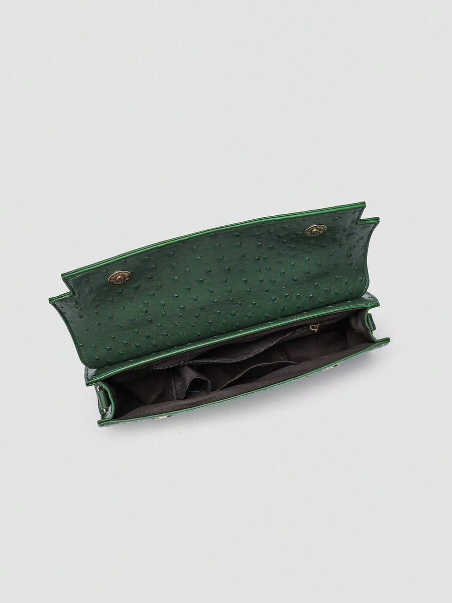Ostrich embossed structured top handle shoulder bag with flap closure and adjustable strap