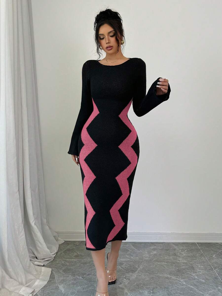 Front view of pink and black colorblock long-sleeve knit dress with slim fit and straight midi hem