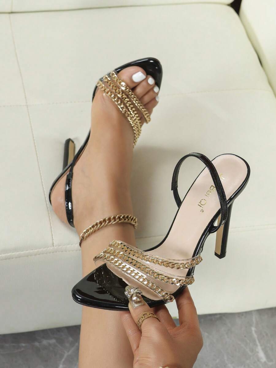 Step into the spotlight with these stunning silver high heel sandals that scream sophistication and sass. Featuring a sleek pointy toe silhouette, mesmerizing snake skin pattern, and dazzling crystal embellishments, these beauties are your ticket to turning heads at any celebration. Whether you're dancing the night away or making a grand entrance, these heels deliver the perfect blend of glamour and edge. Slip them on and let your feet do the talking—because ordinary just isn't in your vocabulary.