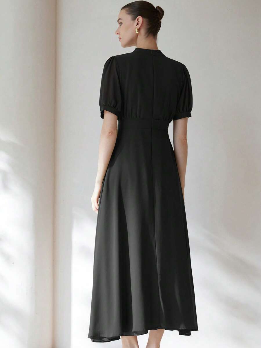 Effortlessly chic and wonderfully wearable, this elegant chiffon dress brings a touch of sophistication to your everyday routine. The delicate pleated bust adds dimension and flattering structure, while romantic princess sleeves frame your shoulders with graceful charm. Cut to a versatile knee length, it's the perfect companion for commuting, casual outings, or weekend adventures. The flowing chiffon fabric moves beautifully with you, offering comfort without compromising on style. Whether you're heading to