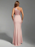 one-shoulder formal evening gown with asymmetric sequin bodice, smooth floor-length skirt, fitted mermaid column silhouette, ruched waist and hip, wrap front overlay and high thigh slit in multiple colors image 3