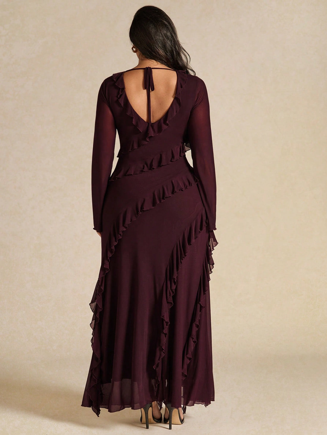 Elevate your wardrobe with this fabulous plus-size ruffle dress that's ready for anything! Featuring elegant long sleeves and charming ruffled details, it's the perfect companion for autumn dates, breezy beach getaways, and festive holiday parties. The flattering silhouette celebrates your curves while the versatile design transitions seamlessly from season to season. Whether you're dressing up for a special occasion or keeping it casual-chic, this dress delivers style and confidence in every wear. A wardro