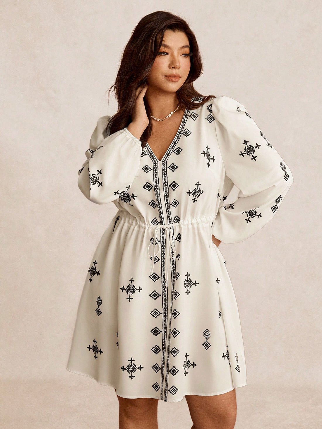 Embrace your curves with confidence in this stunning plus-size dress that's all about celebrating you! Featuring a chic placement print that flatters your figure and a ruched waist that cinches in all the right places, this dress delivers effortless elegance for any occasion. The thoughtful design creates a gorgeous silhouette while keeping you comfortable and fabulous. Whether you're heading to brunch, a night out, or anywhere in between, this wardrobe essential proves that style has no size limit. Slip it