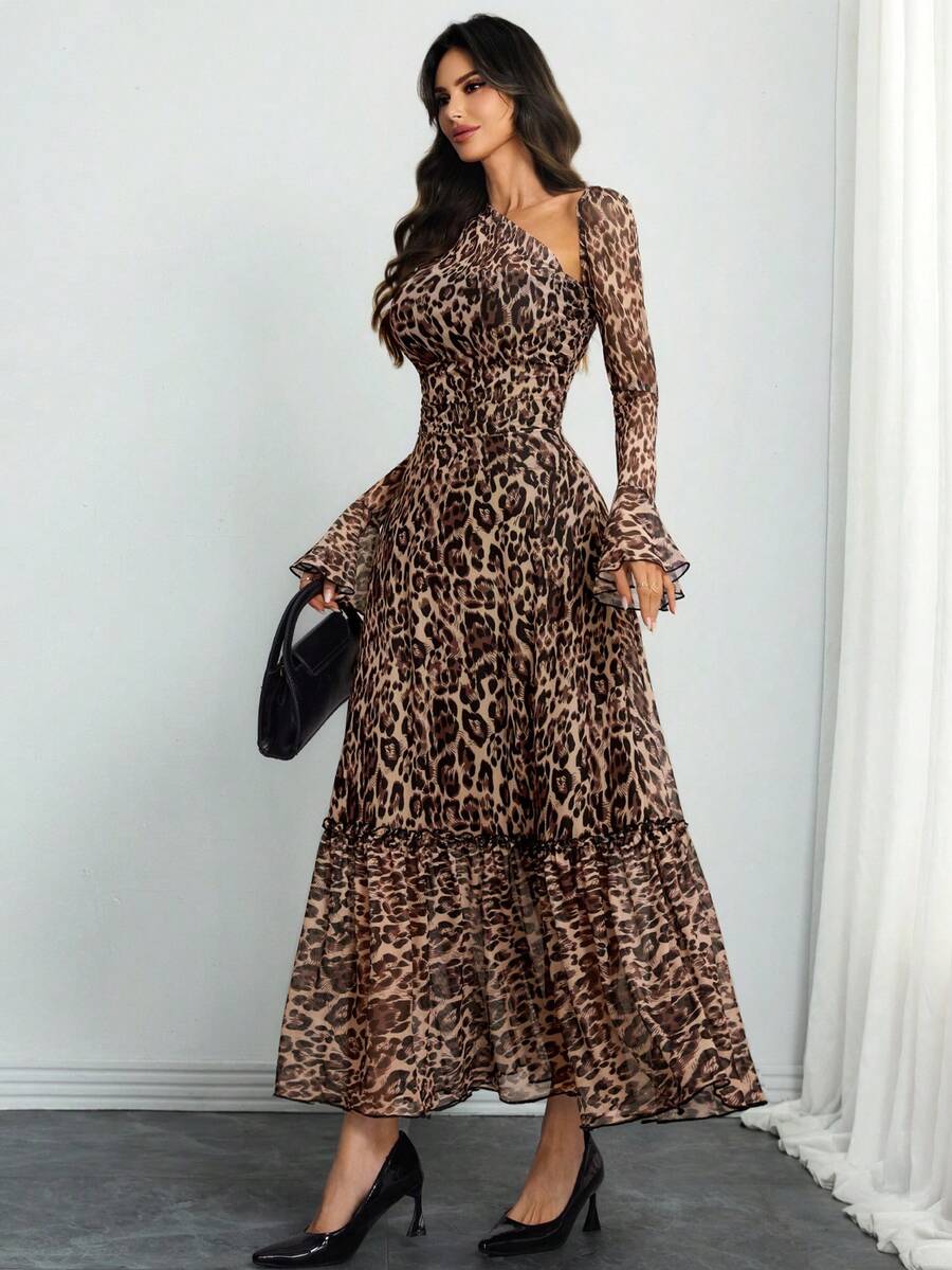 Experience the breathtaking fusion of heritage animal-print artistry and sharp, modern architectural tailoring. This stunning ruffle-layered ensemble is meticulously designed for the woman who values a high-fashion, "quiet luxury" approach to seasonal dressing—the ultimate centerpiece for prestigious spring retreats, exclusive garden outings, and high-authority weekend getaways.
